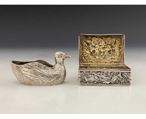 A Continental silver snuff box, the exterior decorated with classical scenes, including musical instruments and figures in pe
