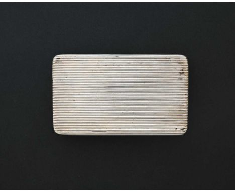 A nineteenth-century Continental silver-coloured metal snuff box, the exterior with reeded decoration, the hinged cover opens