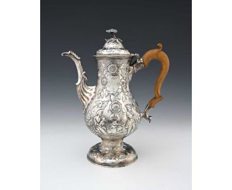 Ireland.An eighteenth-century Irish silver Chinoiserie coffee pot, of baluster form, atop a spreading circular form foot, the