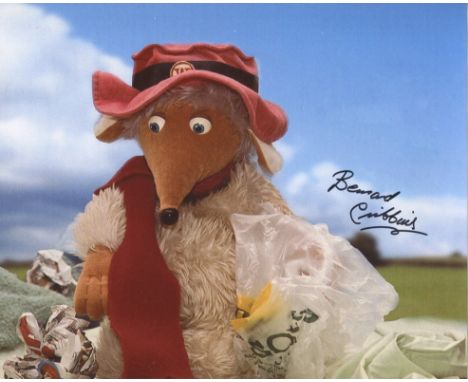 The Wombles. 8x10 photo signed by actor Bernard Cribbins who was narrator for the series. Good condition Est.