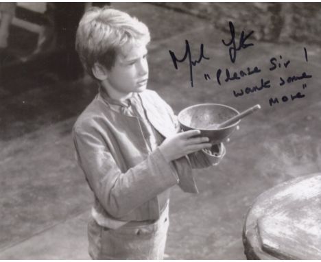 Oliver! 8x10 inch photo from one of the great British musicals, signed by actor Mark Lester who has added the immortal line C