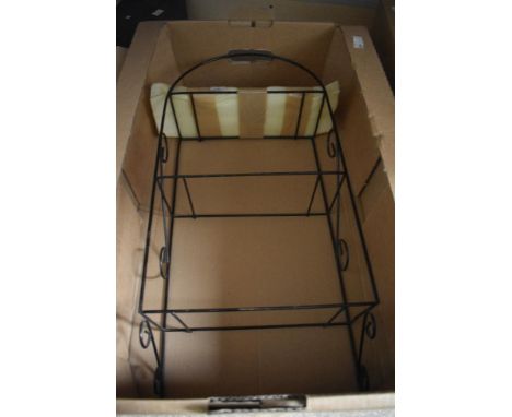 A vintage wire wall shelf having three glass shelves, four etching prints mainly of Rugby School and two unframed prints of T