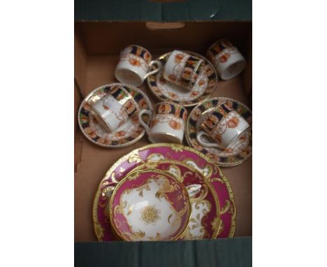 Six Burgess Bros, Carlisle Ware coffee cans and saucers and a pretty trio in cream, pink and white with gilt design.