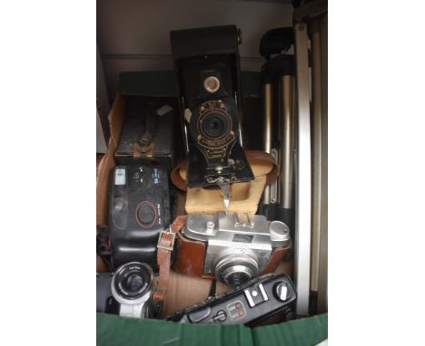A selection of cameras. A Kodak 2A folding camera, a Kodak Brownie No2 Brownie, a Yashica MG-1, an Agfa Silette and a Sony Ha