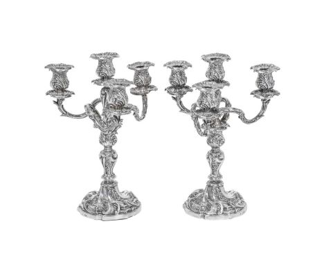 A Pair of Victorian Silver Four-Light Candelabra,  by Richard Hodd and Richard Hodd, London, 1895 each in the rococo style, o