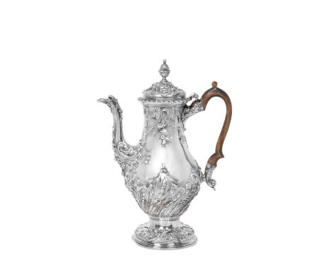 A George III Silver Coffee-Pot,  by Daniel Smith and Robert Sharp, London, 1763 pear-shaped and on spreading foot, the foot, 