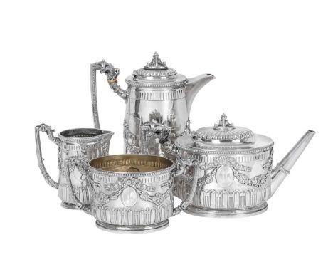 A Four-Piece Victorian Silver Tea-Service,  by John Aldwinckle and Thomas Slater, London, 1888 tapering oval and with fluted 