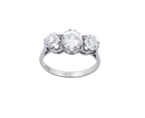 A Diamond Three Stone Ringthe graduated old cut diamonds in white double claw settings, to a tapered shoulder plain polished 
