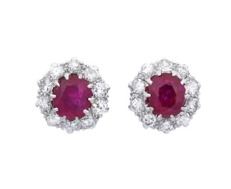 A Pair of Ruby and Diamond Cluster Earringsan oval cut ruby within a border of ten round brilliant cut diamonds in white claw