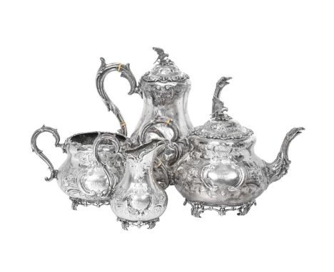 A Four-Piece Victorian Silver Tea and Coffee-Service,  by Richard Martin and Ebenezer Hall, London, 1874 each piece inverted 