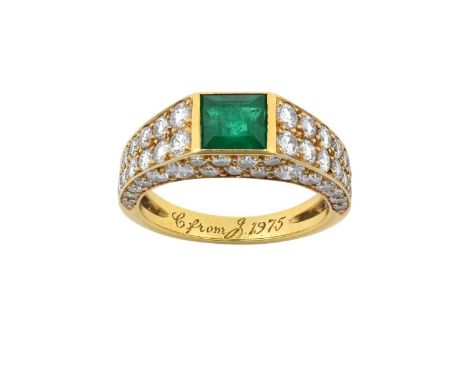 An Emerald and Diamond Ring, by Cartierthe rectangular step cut emerald in a yellow rubbed over setting, to round brilliant c