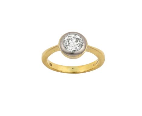 An 18 Carat Gold Diamond Solitaire Ringthe old cut diamond in a white rubbed over setting, to a yellow tapered shoulder plain