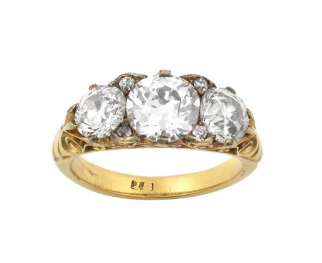 A Victorian Diamond Three Stone Ringthe graduated old cut diamonds with a pair of eight-cut diamond accents in between, in ye