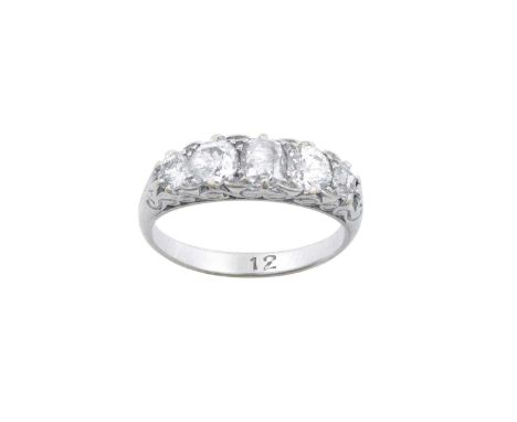 A Diamond Five Stone Ringthe graduated old cut diamonds, in white claw settings, with a scroll gallery, to a plain polished s