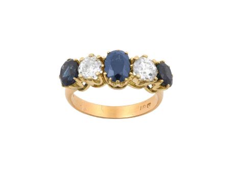 A Sapphire and Diamond Five Stone Ringthree oval cut sapphires alternate with old cut diamonds, in yellow claw settings, to a