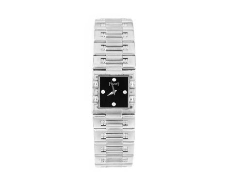 Piaget: A Lady's 18 Carat White Gold Wristwatch, signed Piaget, model: Dancer, ref: 15317K81, circa 1995, quartz battery move