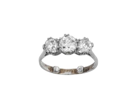 A Diamond Three Stone Ring the old cut diamonds in white double claw settings, to a tapered shoulder plain polished shank, to