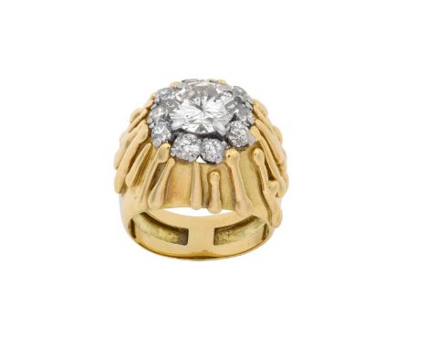 An 18 Carat Gold Diamond Ring, by Andrew Grimathe central raised round brilliant cut diamond within a border of old cut diamo