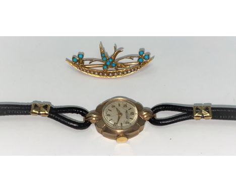 A ladies Rotary 9 carat hallmarked gold wristwatch on brown strap; a yellow metal bar brooch set turquoise and seed pearl 