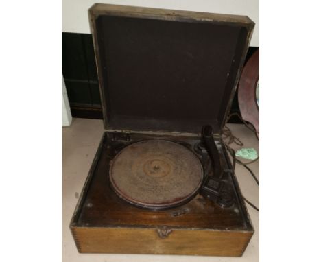 An early electric table top record player by HMV (sold as a collectors item only) 