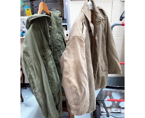 A Military green jacket, single crossed rifle button to shoulder; another military jacket 