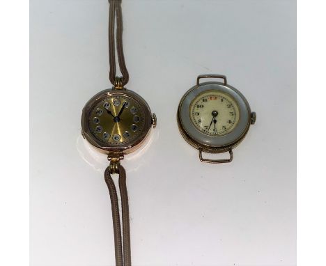 A 1930's ladies 9 carat hallmarked gold wristwatch, octagonal shaped on brown strap (no glass); a similar watch with mother-o