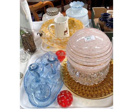 A 1930's spatter glass light bowl and globe; an iridescent cream vase; an Art Deco blue trinket set; decorative glassware 