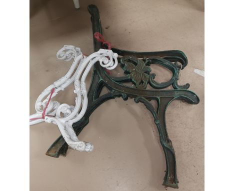 A pair of cast metal Victorian style bench ends and a similar pair 