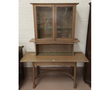 A modern Ercol full height display cabinet, 'Silver Mist', with double glazed cupboards over double drawers and shelf, height