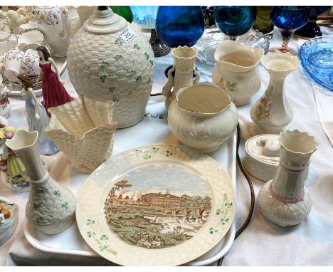 A Belleek table lamp; a plate depicting Belleek pottery; other Belleek 