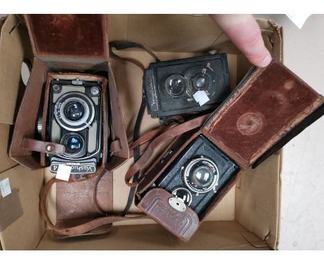 A Yashica 44 TLR camera; 2 Voigtlander examples 
