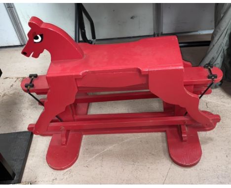 A c 1950's / 60's red child's small rocking horse