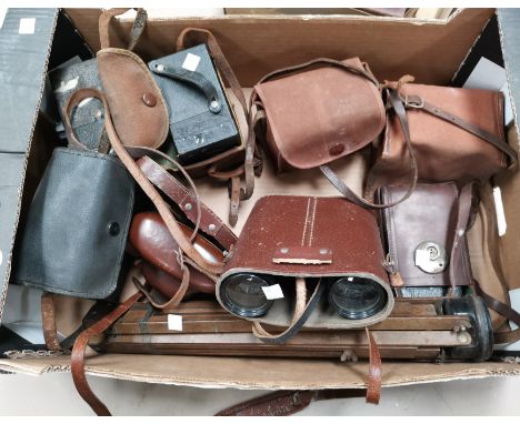 A King Regular 35 mm camera; a folding camera; 5 box cameras; a pair of Lieberman binoculars (a.f.); a folding tripod 
