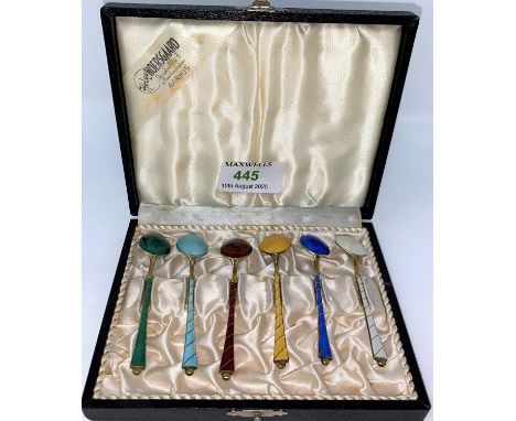 A cased set of six Danish gilded and individually coloured enamel coffee spoons stamped Denmark Stirling 