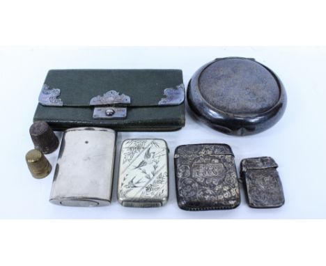 A SILVER PLATED SNUFF BOX an engraved silver vesta case, an unmarked white metal vesta case with aesthetic movement decoratio