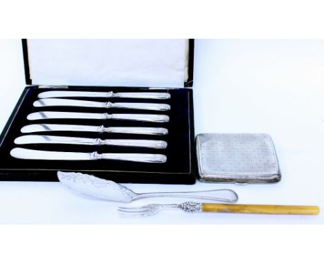 A CASED SET OF SIX SILVER HANDLED BUTTER KNIVES, a silver engraved cigarette case, silver tipped pickle fork and one other (4