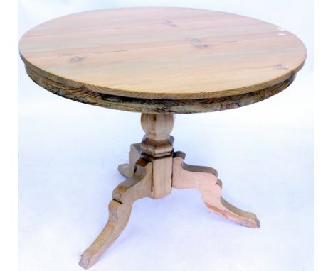 A PINE CIRCULAR DINING TABLE  on tripod base 100cm diameter