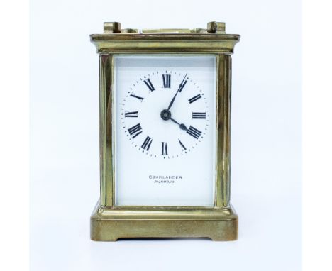 A 20TH CENTURY BRASS CASED CARRIAGE CLOCK The case inscribed Richmond Military Hospital March 25th 1915, measures 14.5cm high