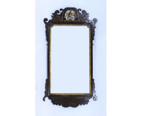 A GEORGIAN STYLE FRET FRAMED WALL MIRROR with hoho bird crest, 56cm wide x 104cm high 