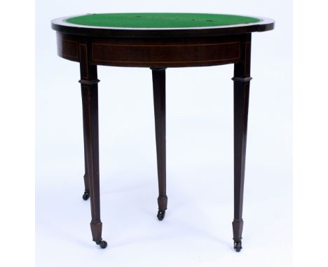A 19TH CENTURY MAHOGANY FOLD OVER CARD TABLE with green baize lining and boxwood inlay, standing on square tapering legs term