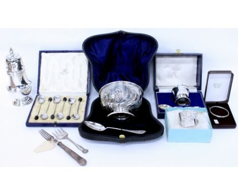 SILVER ITEMS TO INCLUDE a sugar bowl and spoon in a fitted case, a christening egg cup and spoon in a fitted case, silver nap