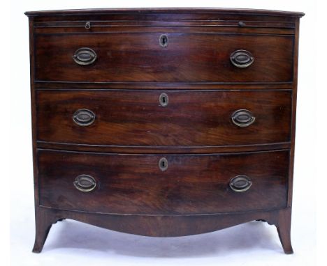 A 19TH CENTURY MAHOGANY BOW FRONTED CHEST OF THREE LONG DRAWERS beneath a brushing slide, and on outswept bracket feet, 98.5c