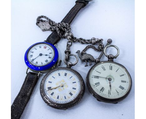 THREE LADIES SILVER POCKET WATCHES to include a Swiss example on an unmarked white metal fob chain, and one with a blue ename