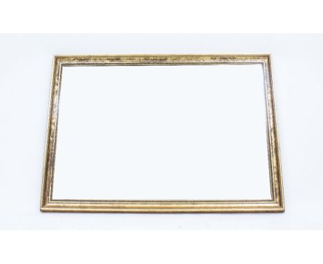 A RECTANGULAR GILT FRAMED WALL MIRROR 100cm x 70cm 
