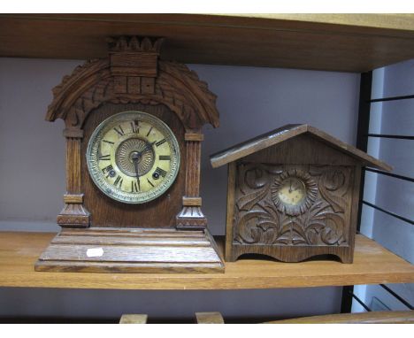 An Oak 'Ansonia Clock Company' Oak Cased Mantel Clock, carved arched pediment on stepped plinth, movement stamped 'Patent 188