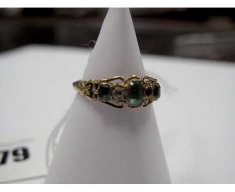 A XIX Century Five Stone Ring, collet set (closed back setting) with rose cut diamonds highlights (one missing).