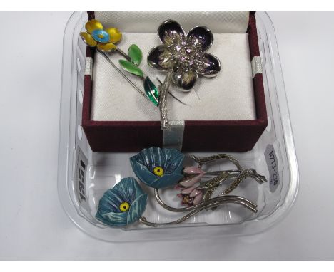 Bernard Instone; A Vintage Enamel Flower Brooch, stamped "Silver B.I.", together with other floral brooches (one lacking pin)