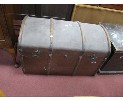 A Wood Bound Hessian Travelling Trunk, with dome top and leather handles (one absent) 92cm wide.