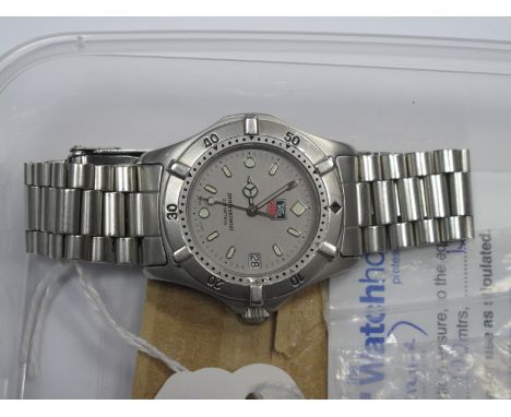Tag Heuer; A Professional 200 Meters Gent's Wristwatch, (WE 1211-R), the grey dial with centre seconds and date aperture, to 