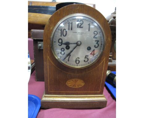An Early XX Century Walnut Oak Inlaid Mantel Clock by "James Walker Ltd. London", with arched case, silvered dial, batwing in